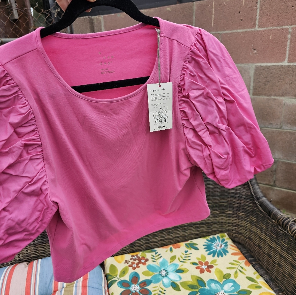 Pink crop top with puffy sleeves